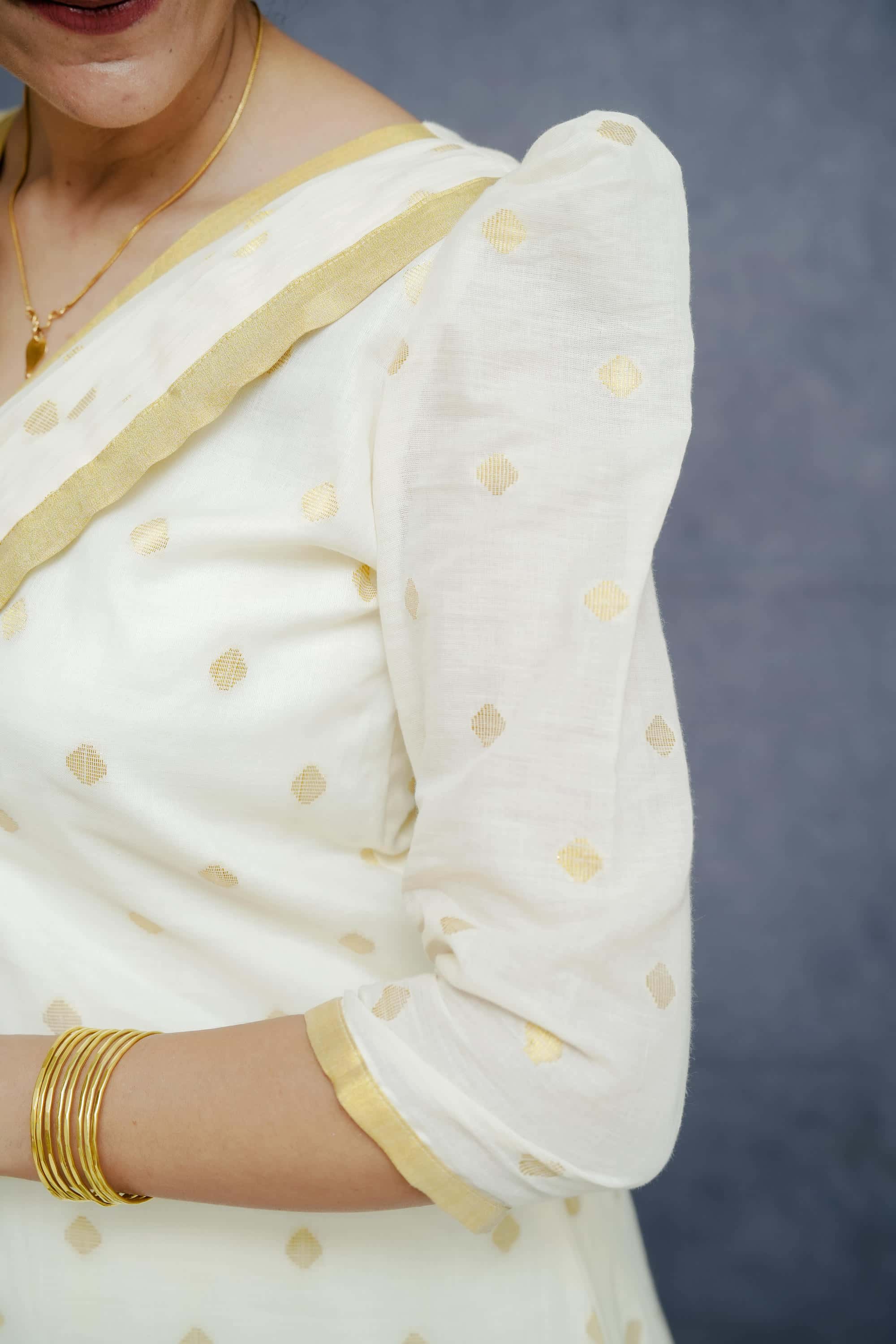 Off White A line Cotton Dress with Golden Plates & Highlights