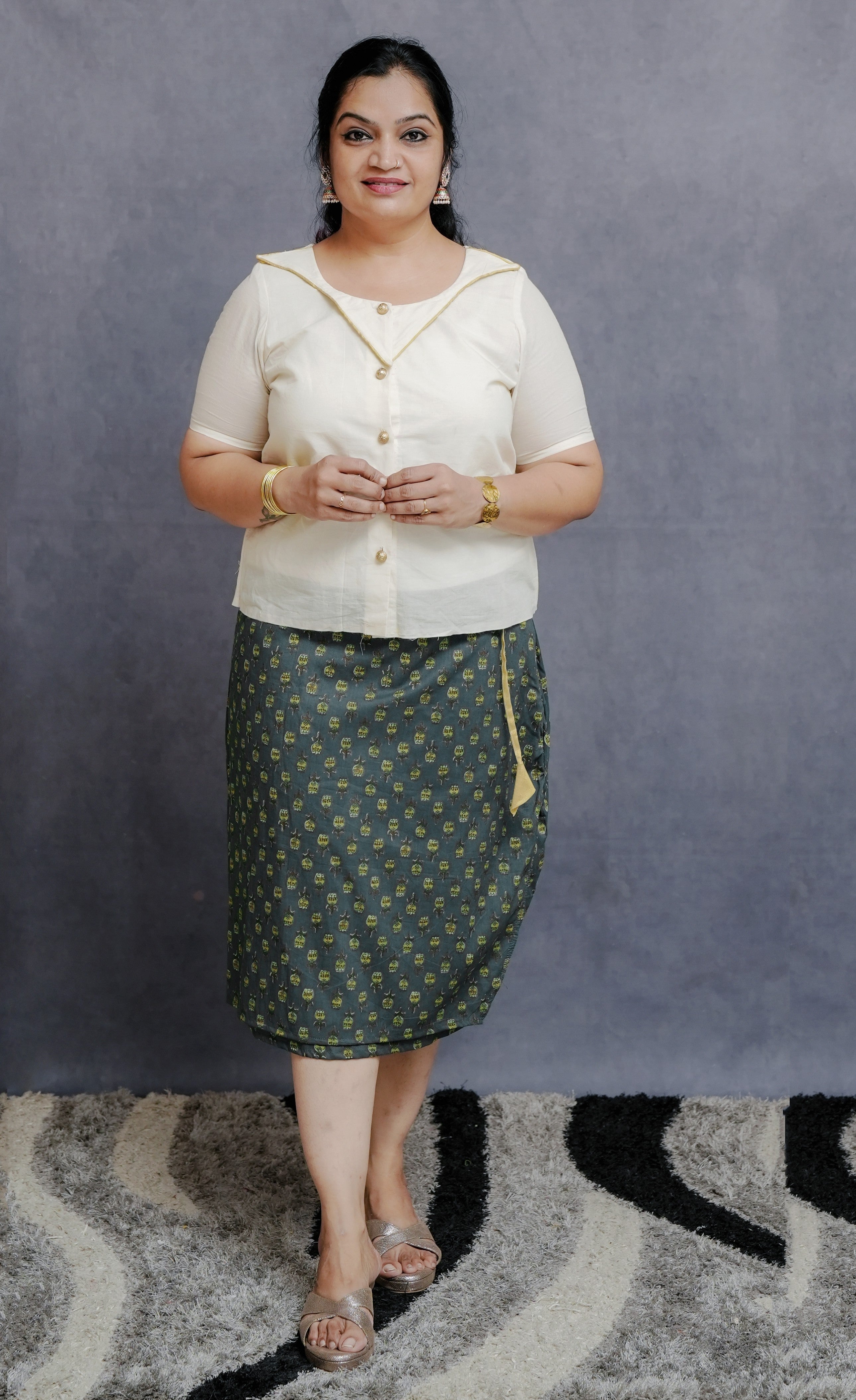 Off white Cotton Top in Golden Detailing with Printed Green Wrap around Skirt