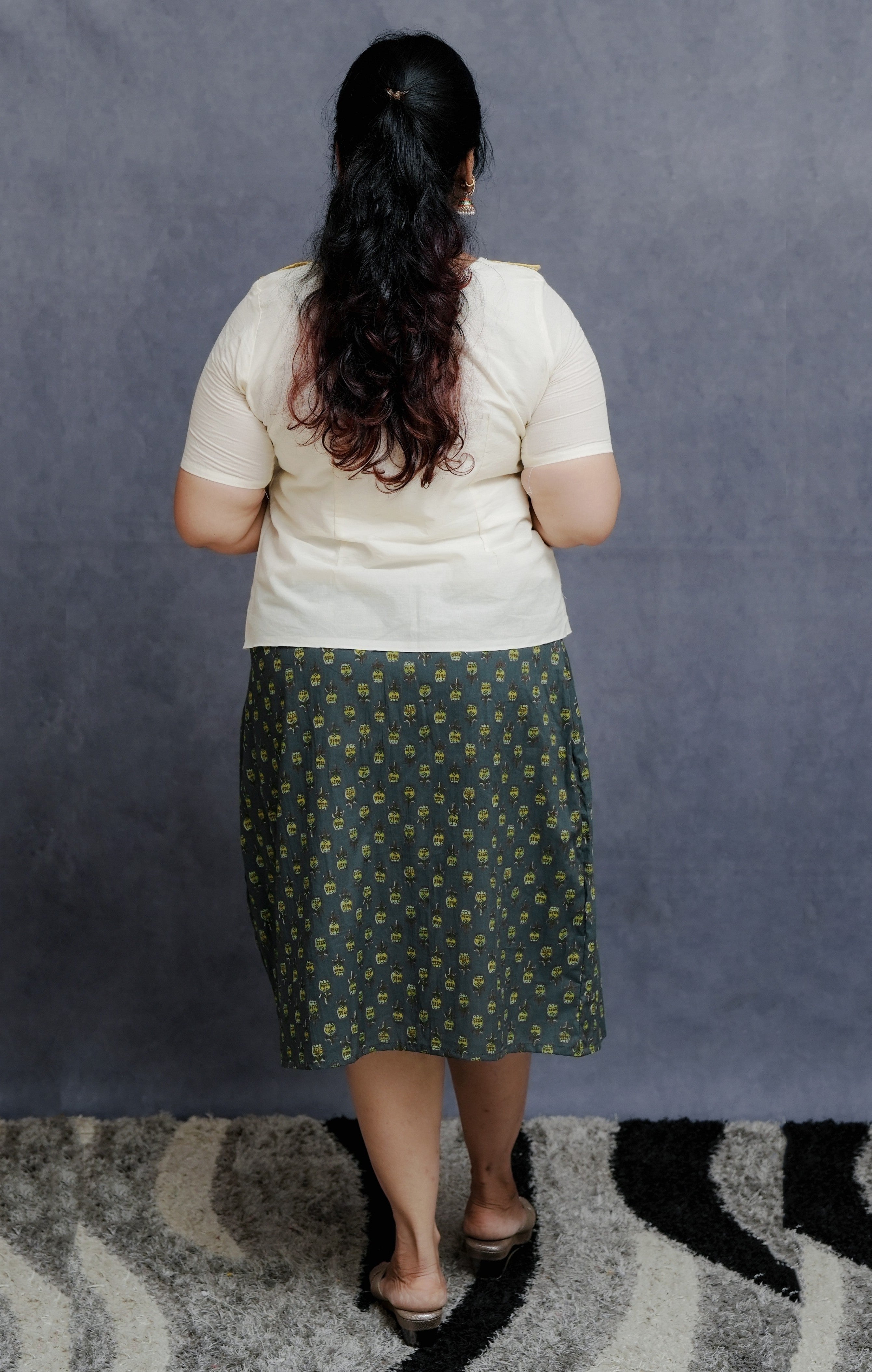 Off white Cotton Top in Golden Detailing with Printed Green Wrap around Skirt